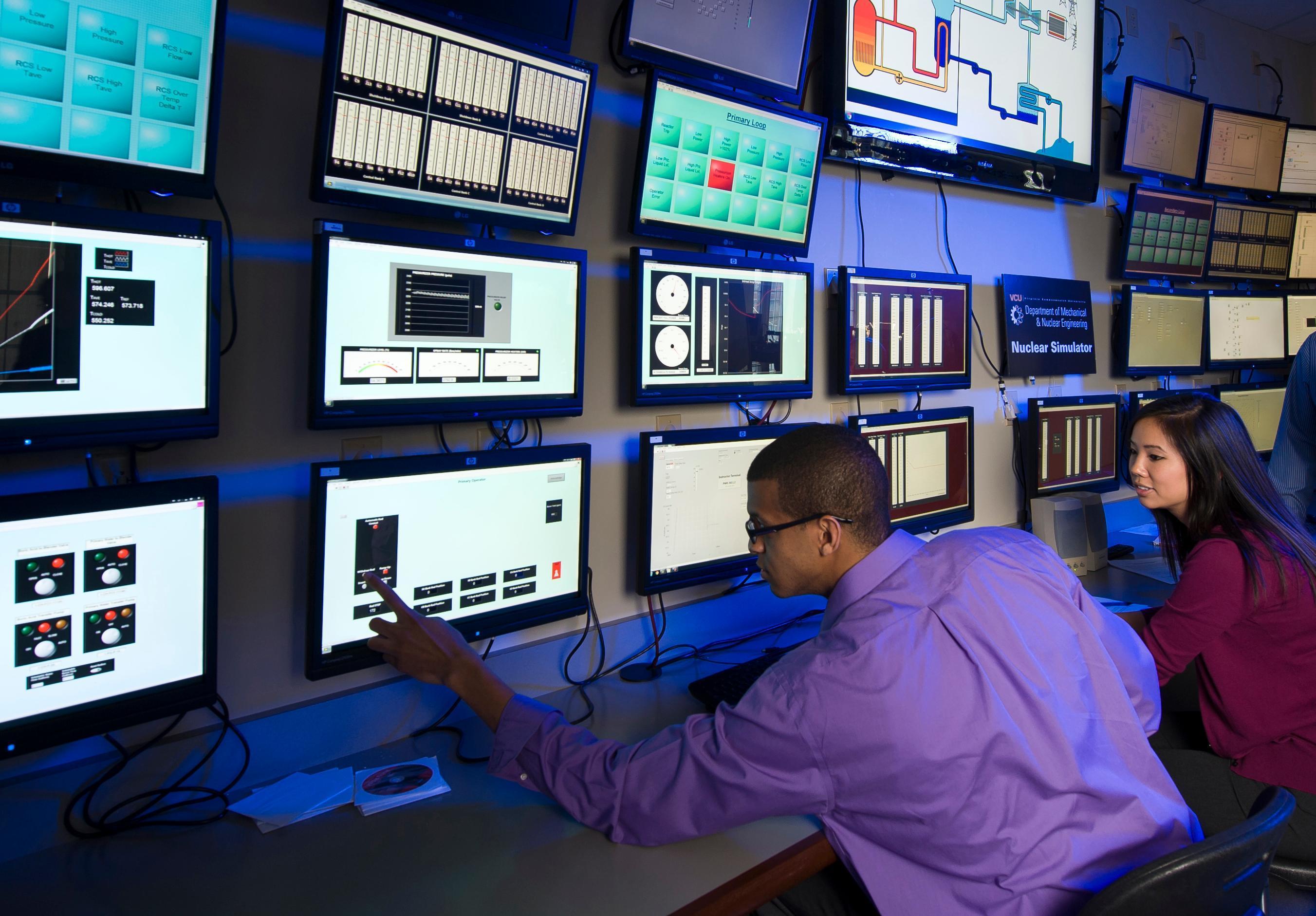 Students in the College of Engineerings Nuclear Power Simulator lab