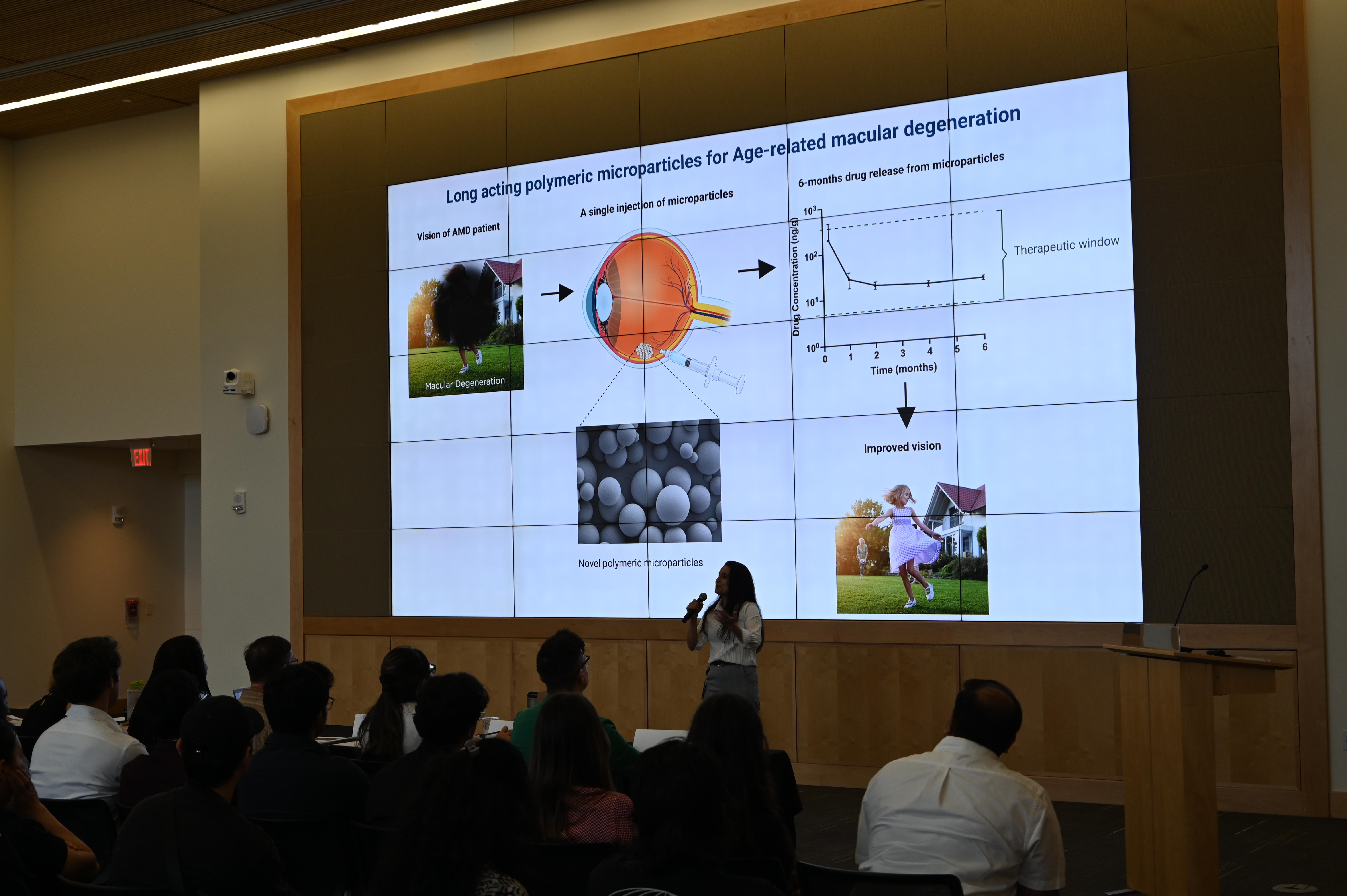 A student giving a presentation during a competition