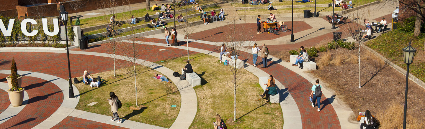 Students sitting outside on a nice winter day