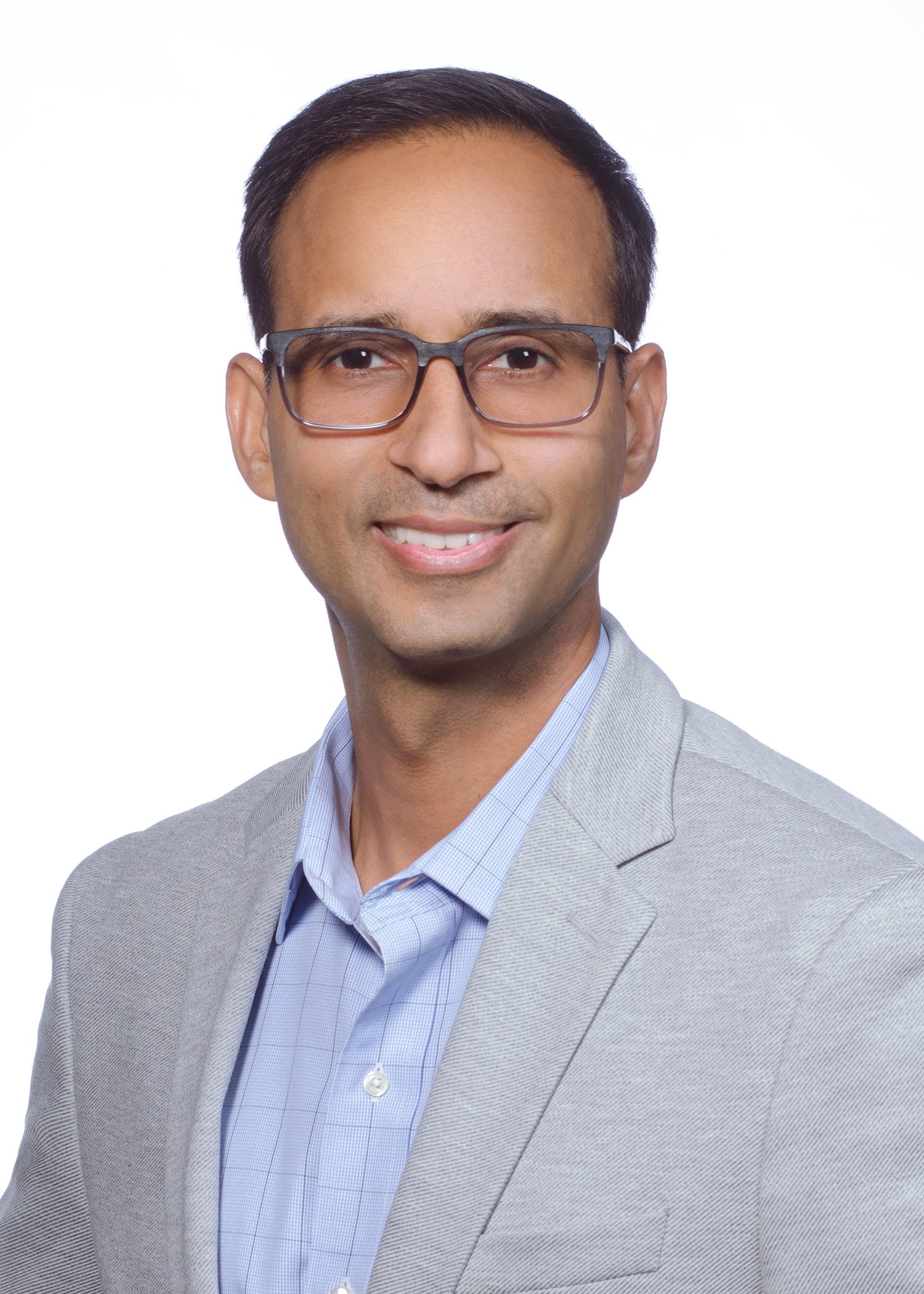 Dr. Manu Gupta smiling